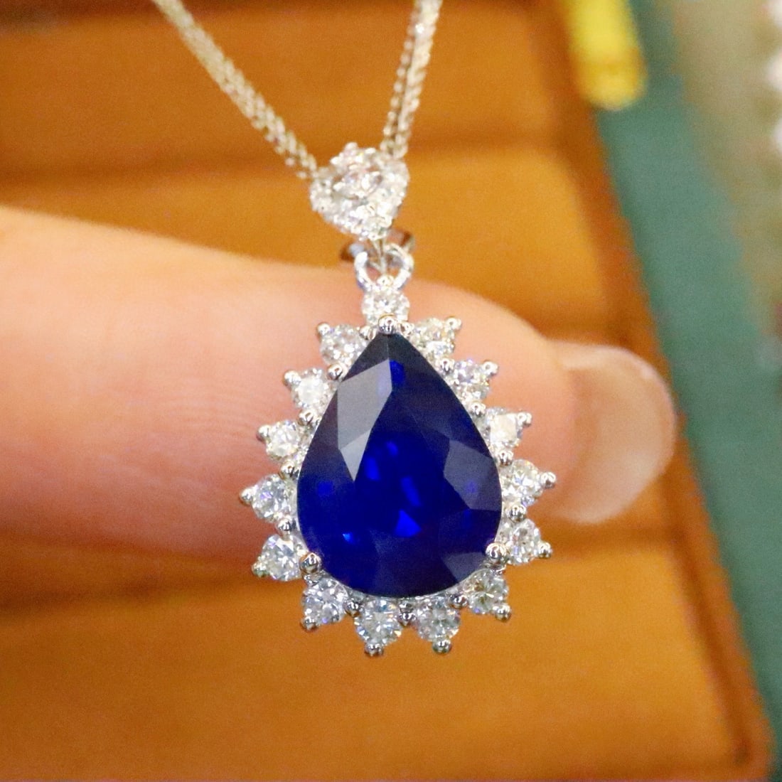 14k Gold 2.78 Ctw Natural Sapphire & Diamond Pendant( Without Chain ): Ref:230986282 // gold content:14k gold // main gemstone:sapphire // shape:pear // carat weight:2. 28ct // color:royal blue // treatment:natural // // adjacent gemstone 2 : diamond // number of stones: