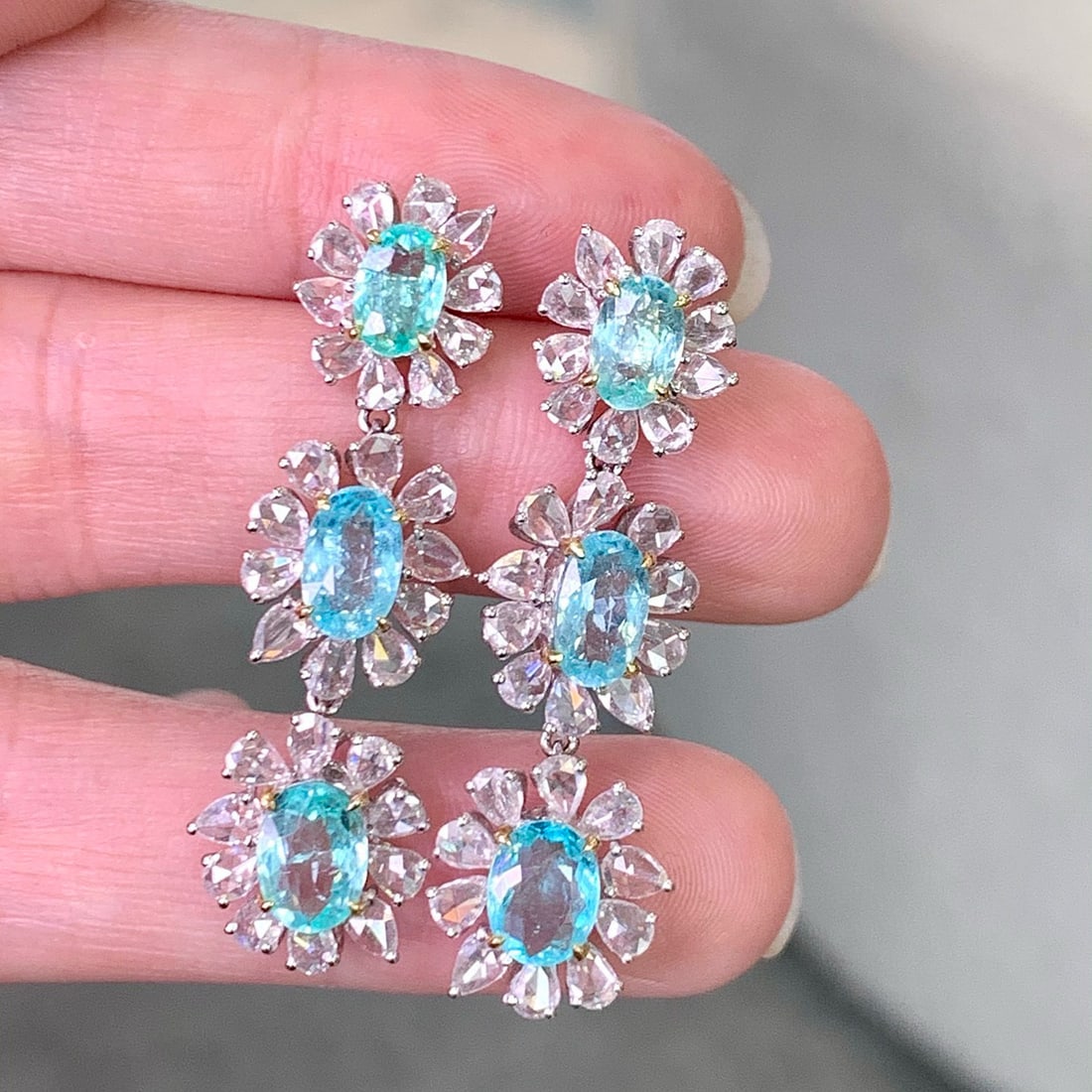 14k Gold 7.97 Ctw Natural Paraiba Tourmaline & Diamond Earrings: Ref:230986304 // gold content:14k gold // main gemstone:paraiba tourmaline // shape:oval // carat weight:5. 12ct // color:blue // treatment:natural // // adjacent gemstone 2 : diamond // shape:pear