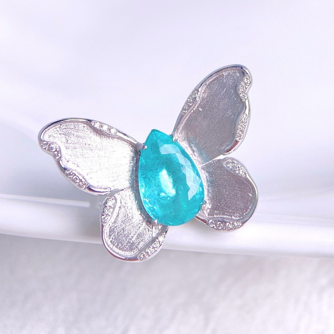 14k Gold 2.11 Ctw Natural Paraiba Tourmaline & Diamond Ring: Ref:230986305 // gold content:14k gold // ring size:7. 25us // // main gemstone:paraiba tourmaline // shape:pear // carat weight:2. 09ct // color:blue // treatment:natural // // adjacent gemstone 2 :