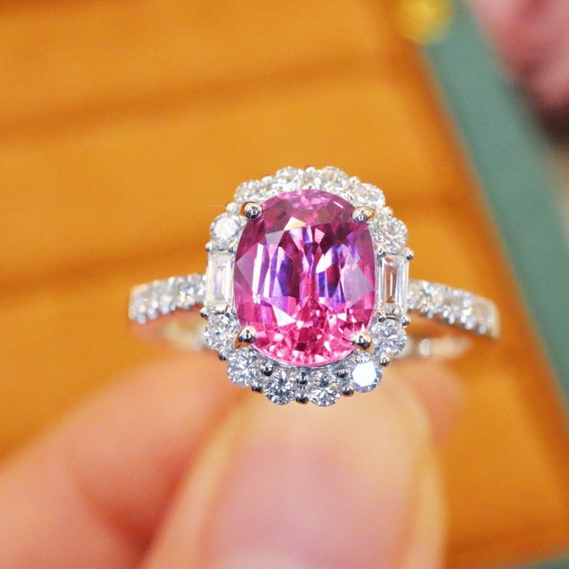 14k Gold 2.28 Ctw Natural Padparadscha Sapphire & Diamond Ring: Ref:230986342 // gold content:14k gold // ring size:7. 25us // // main gemstone:padparadscha sapphire // shape:oval // carat weight:1. 87ct // color:orangish pink // treatment:natural // // adjacent g