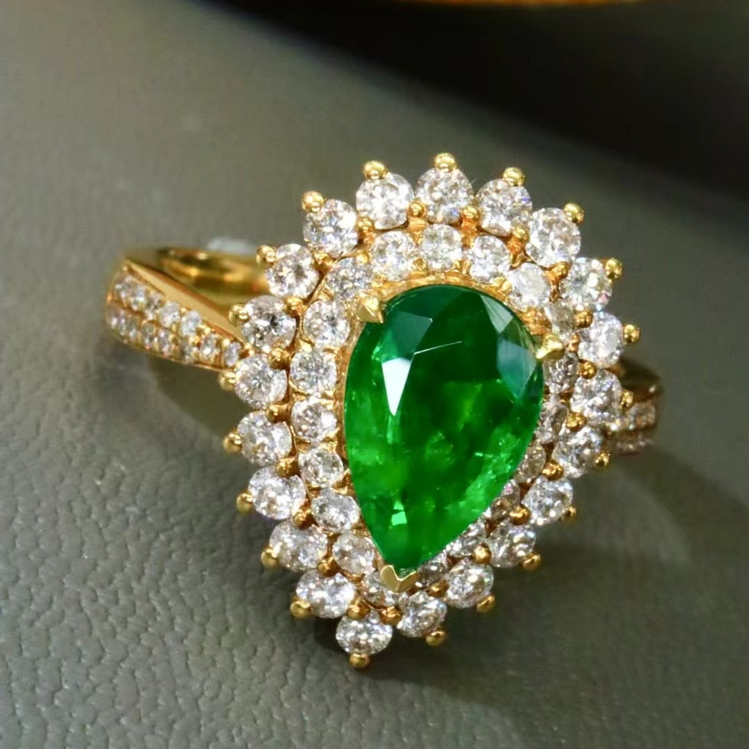14k Gold 2.37 Ctw Vivid Green Natural Emerald & Diamond Ring: Ref:230986361 // gold content:14k gold // ring size:7. 25us // // main gemstone:emerald // shape:pear // carat weight:1. 01ct // color:vivid green // treatment:natural // // adjacent gemstone 2 : diam