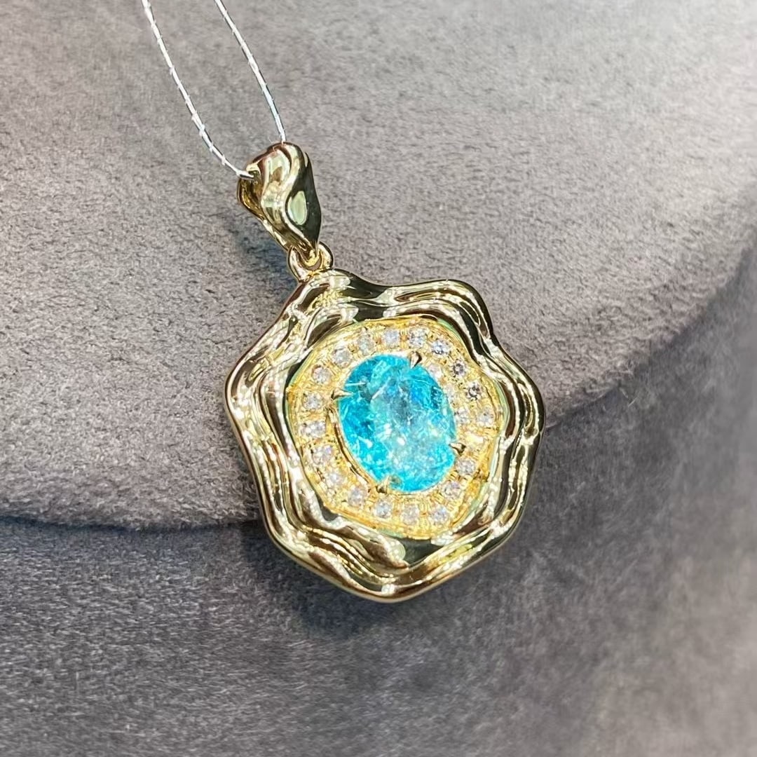 14k Gold 0.66 Ct Natural Paraiba Tourmaline & Diamond Pendant( Without Chain ): Ref:230986371 // gold content:14k gold // main gemstone:paraiba tourmaline // shape:oval // carat weight:0. 66ct // color:blue // treatment:natural // // adjacent gemstone 2 : diamond // number of