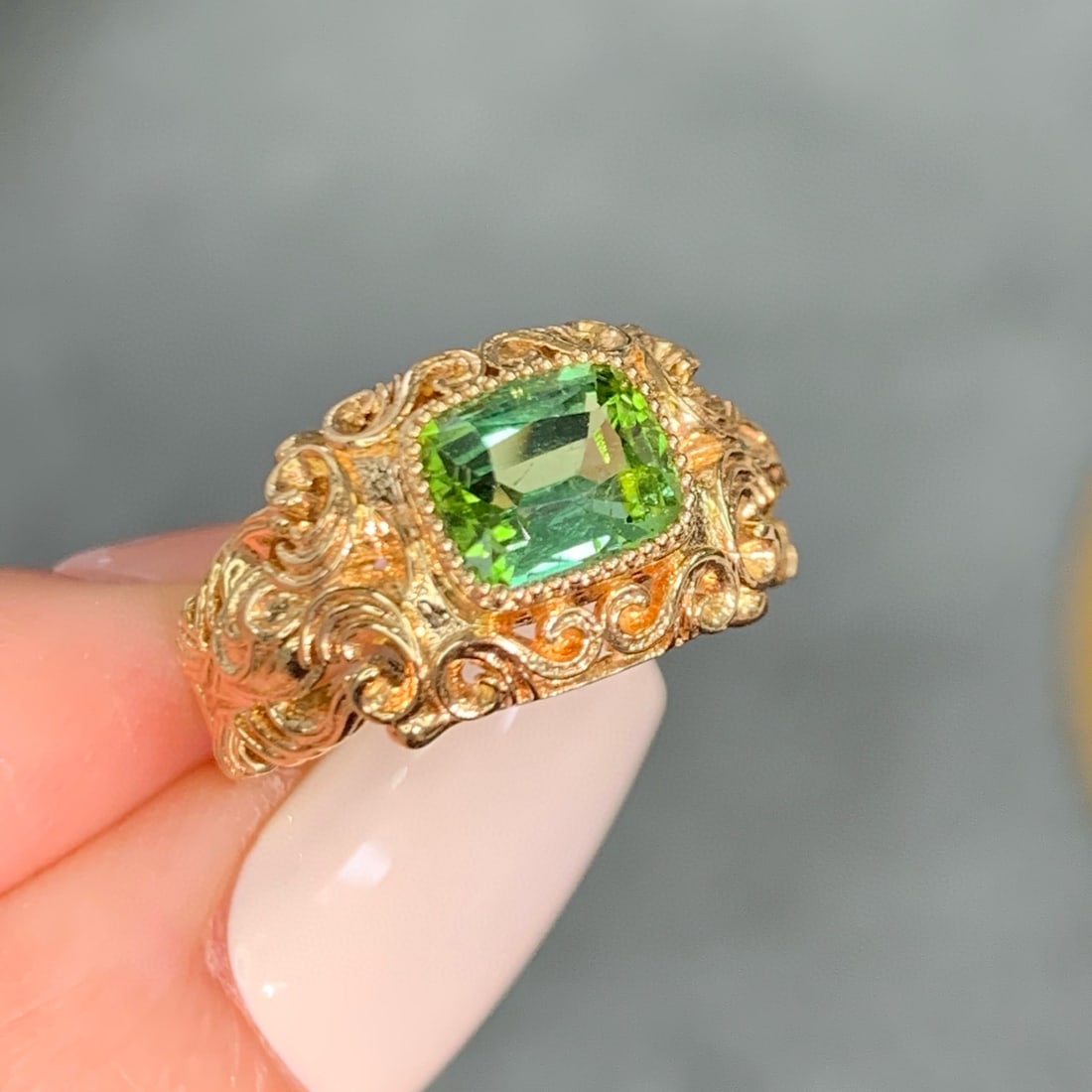 14k Gold 1.38 Ct Natural Tourmaline Ring: Ref:230986374 // gold content:14k gold // ring size:7. 25us // // main gemstone:tourmaline // shape:cushion // carat weight:1. 38ct // color:green // treatment:natural // Condition: New Low Estimate: