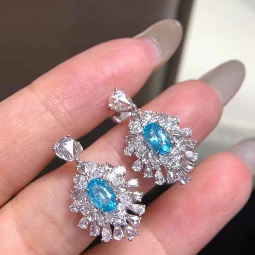 14k Gold 3.12 Ctw Natural Paraiba Tourmaline & Diamond Earrings: Ref:230986403 // gold content:14k gold // main gemstone:paraiba tourmaline // shape:oval // carat weight:1. 14ct // color:blue // treatment:natural // // adjacent gemstone 2 : diamond // shape:multipl