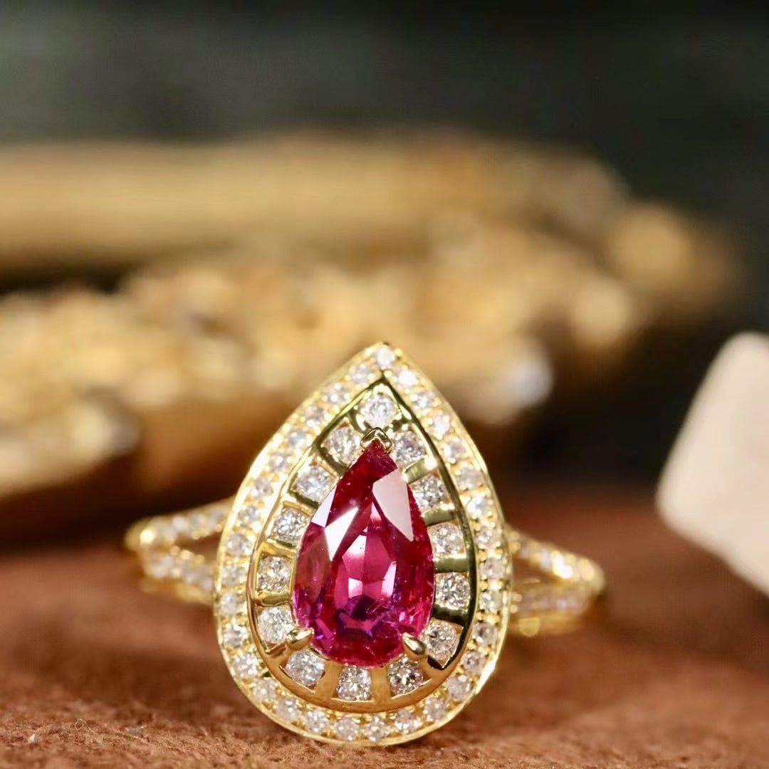 14k Gold 1.18 Ctw Natural Ruby & Diamond Ring: Ref:230986411 // gold content:14k gold // ring size:7. 25us // // main gemstone:ruby // shape:pear // carat weight:0. 84ct // color:red // treatment:natural // // adjacent gemstone 2 : diamond //