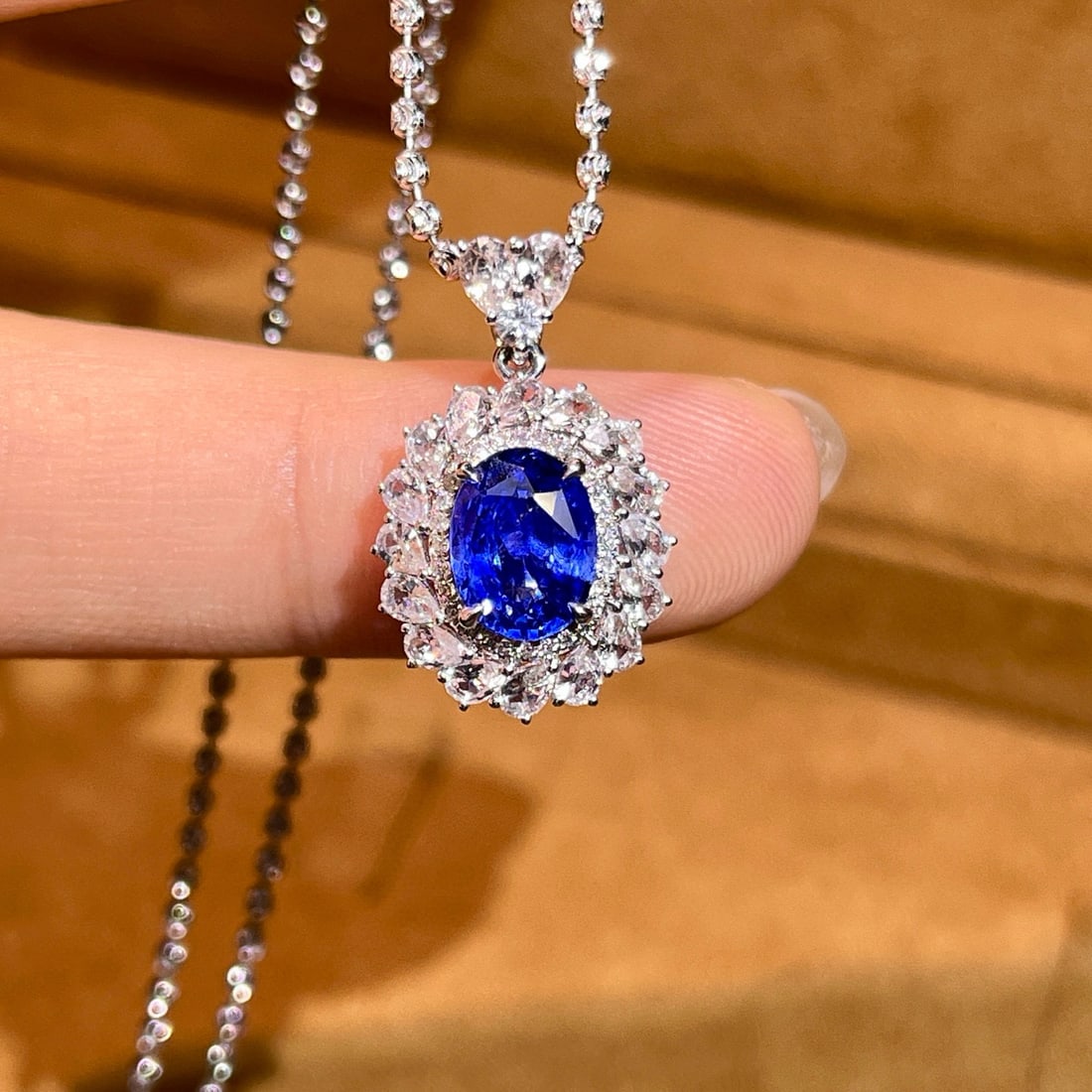 14k Gold 3.34 Ctw Natural Sapphire & Sapphire Pendant( Without Chain ): Ref:230986423 // gold content:14k gold // main gemstone:sapphire // shape:oval // carat weight:2. 05ct // color:blue // treatment:natural // // adjacent gemstone 2 : sapphire // number of stones:28