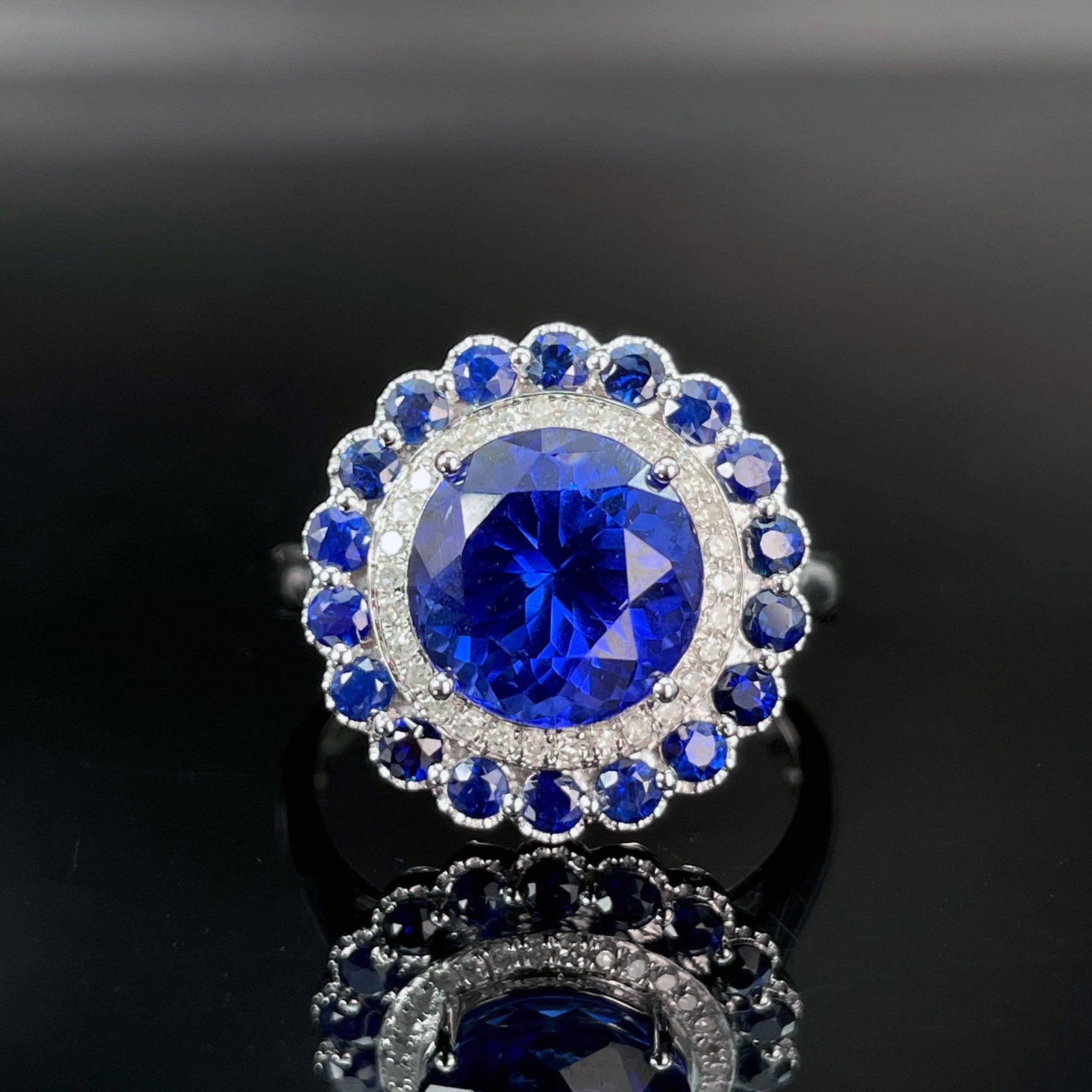 14k Gold 3.5 Ct Natural Tanzanite & Diamond Ring: Ref:230987028 // gold content:14k gold // ring size:7. 25us // // main gemstone:tanzanite // number of stones:1 // shape:round // carat weight:3. 5ct // color:blue // treatment:natural // cut grade:g 