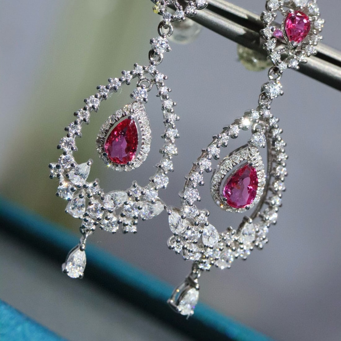 14k Gold 1.54 Ctw Natural Ruby & Diamond Earrings: Ref:230987118 // gold content:14k gold // main gemstone:ruby // shape:pear // carat weight:1. 39ct // clarity grade:vs-si // color:red // treatment:natural // cut grade:g // // adjacent gemstone 2 : d