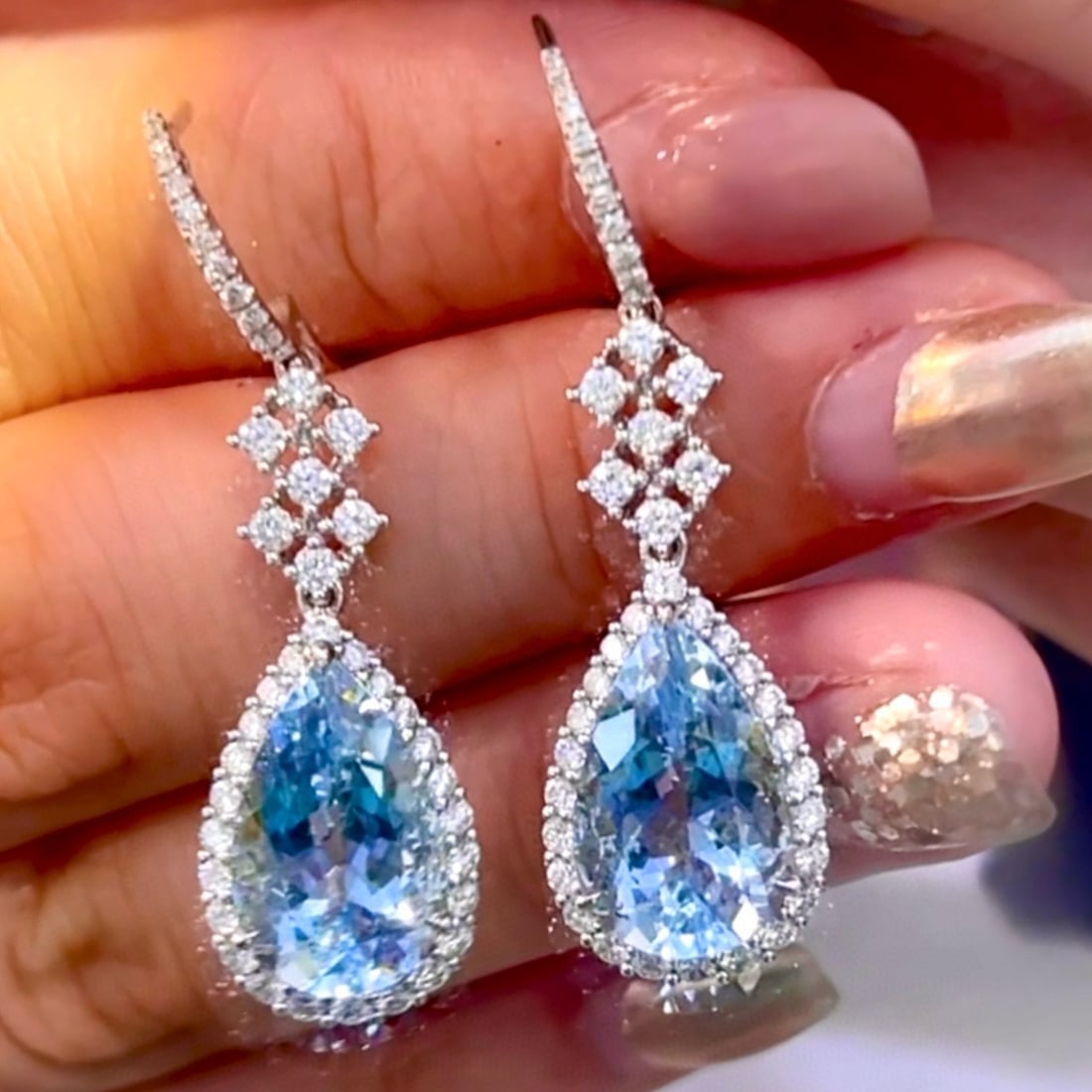 14k Gold 10.4 Ctw Natural Aquamarine & Diamond Earrings: Ref:230987124 // gold content:14k gold // main gemstone:aquamarine // shape:pear // carat weight:9. 0ct // clarity grade:vs-si // color:blue // treatment:natural // cut grade:g // // adjacent