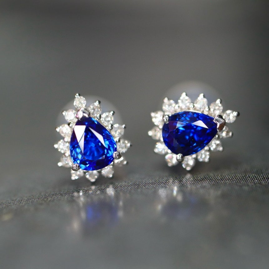 14k Gold 0.87 Ctw Natural Sapphire & Diamond Earrings: Ref:230987142 // gold content:14k gold // main gemstone:sapphire // shape:pear // carat weight:0. 72ct // clarity grade:vs-si // color:blue // treatment:natural // cut grade:g // // adjacent gemstone