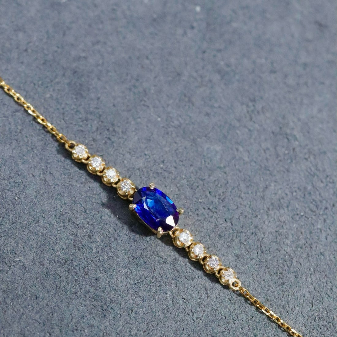 14k Gold 0.71 Ctw Natural Ruby & Diamond Bracelet: Ref:230987153 // gold content:14k gold // main gemstone:ruby // shape:oval // carat weight:0. 65ct // clarity grade:vs-si // color:red // treatment:natural // cut grade:g // // adjacent gemstone 2 :