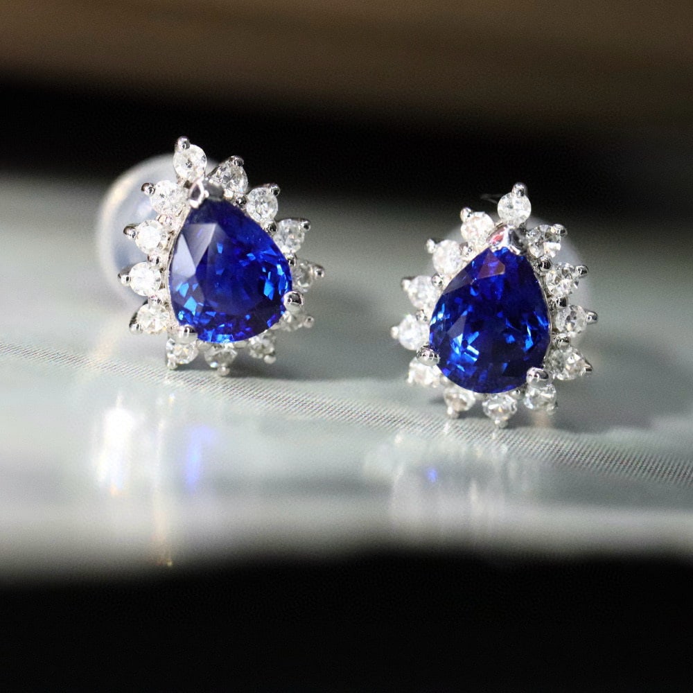 14k Gold 0.87 Ctw Natural Sapphire & Diamond Earrings: Ref:230987155 // gold content:14k gold // main gemstone:sapphire // shape:pear // carat weight:0. 72ct // clarity grade:vs-si // color:blue // treatment:natural // cut grade:g // // adjacent gemstone