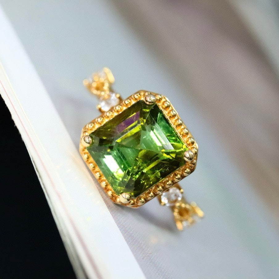 14k Gold 3.86 Ctw Natural Tourmaline & Sapphire Ring: Ref:230987166 // gold content:14k gold // ring size:7. 25us // // main gemstone:tourmaline // shape:emerald // carat weight:3. 63ct // clarity grade:vs-si // color:green // treatment:natural // cut