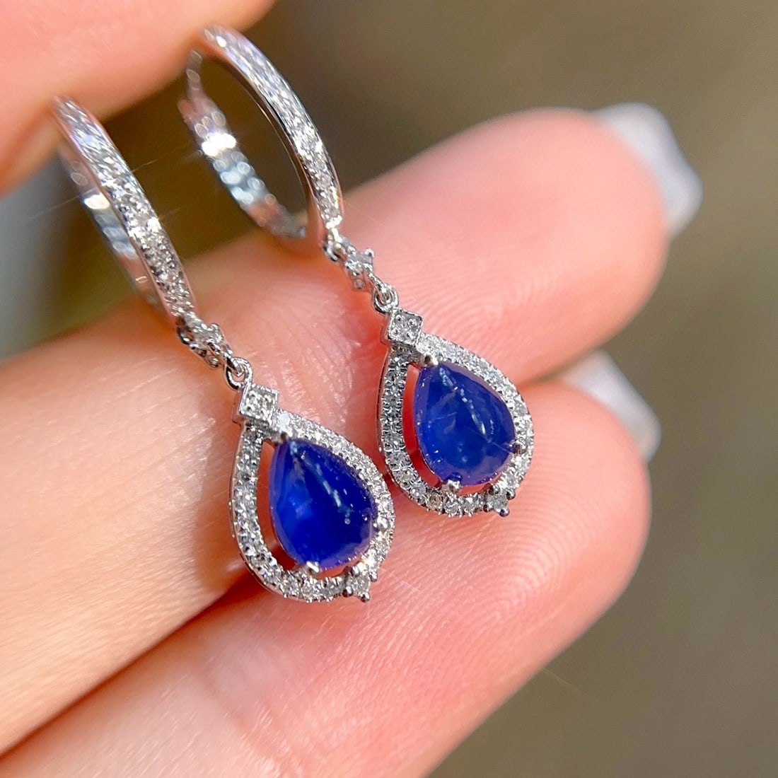 14k Gold 1.68 Ct Natural Sapphire & Sapphire Earrings: Ref:230987170 // gold content:14k gold // main gemstone:sapphire // shape:pear // carat weight:1. 68ct // clarity grade:vs-si // color:blue // treatment:natural // cut grade:g // // adjacent gemstone 