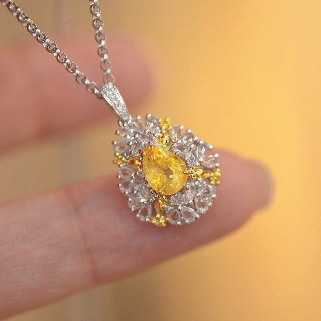 14k Gold 0.92 Ct Natural Sapphire & Diamond Pendant( Without Chain ): Ref:230987191 // gold content:14k gold // main gemstone:sapphire // shape:pear // carat weight:0. 92ct // color:yellow // treatment:natural // cut grade:g // // adjacent gemstone 2 : diamond //