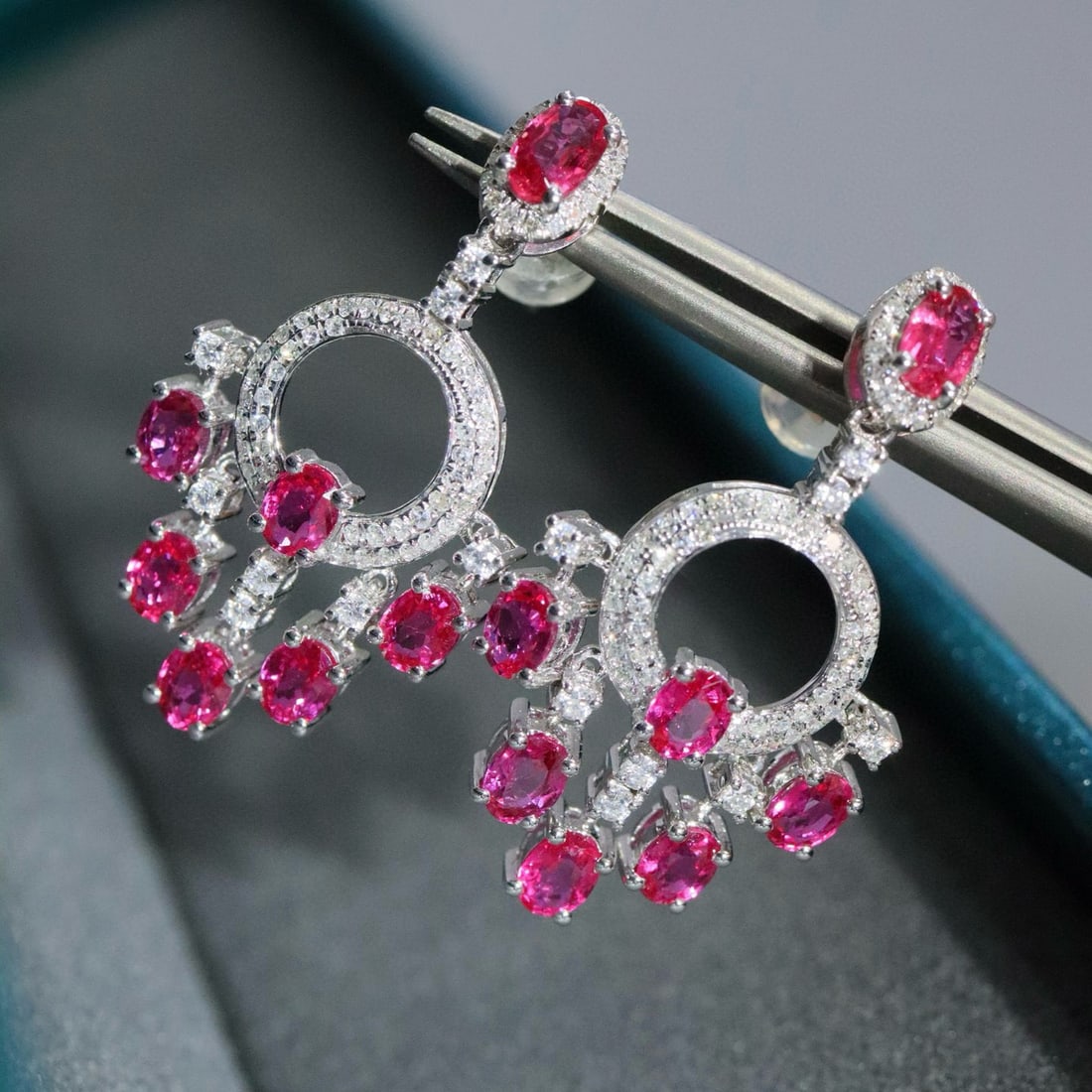 14k Gold 3.11 Ctw Natural Ruby & Diamond Earrings: Ref:230987239 // gold content:14k gold // main gemstone:ruby // shape:oval // carat weight:2. 61ct // color:red // treatment:natural // cut grade:g // // adjacent gemstone 2 : diamond // shape:round