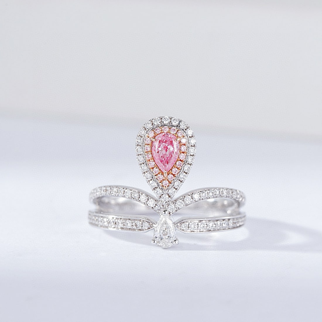 14k Gold 0.56 Ctw Natural Pink Diamond & Diamond Ring: Ref:230988002 // gold content:14k gold // ring size:7. 25us // // main gemstone:pink diamond // shape:pear // carat weight:0. 21ct // color:pink // treatment:natural // // adjacent gemstone 2 : diamon