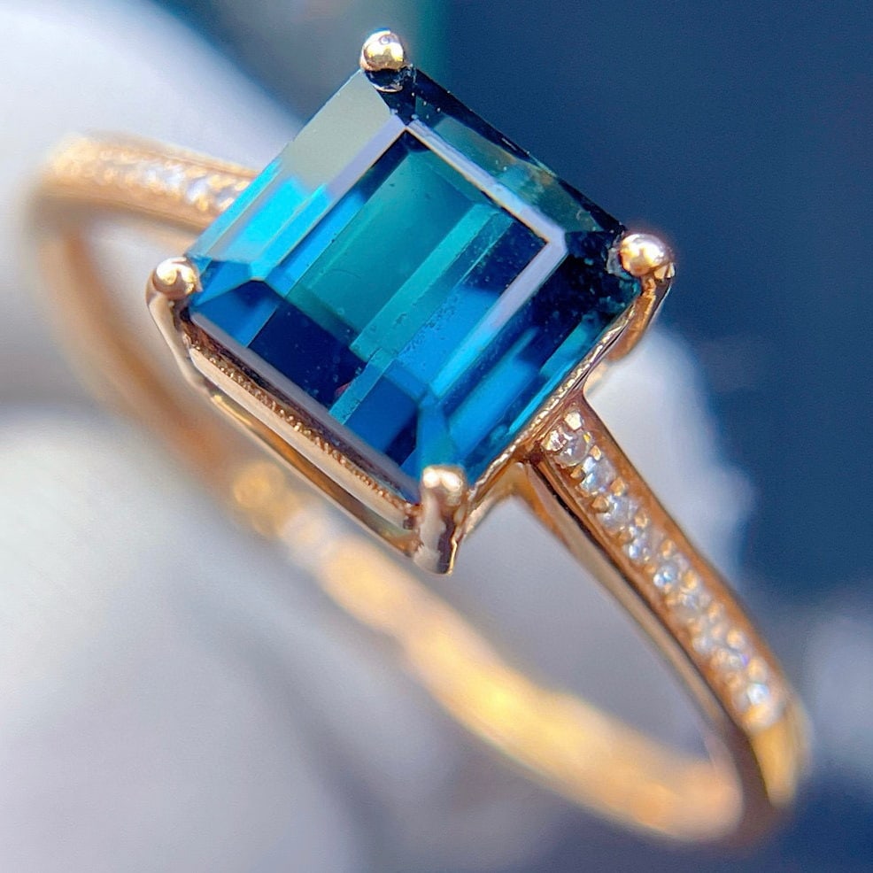 14k Gold 2.45 Ct Natural Tourmaline & Diamond Ring: Ref:230988015 // gold content:14k gold // ring size:7. 25us // // main gemstone:tourmaline // shape:octagonal // carat weight:2. 45ct // color:blue // treatment:natural // // adjacent gemstone 2 : dia
