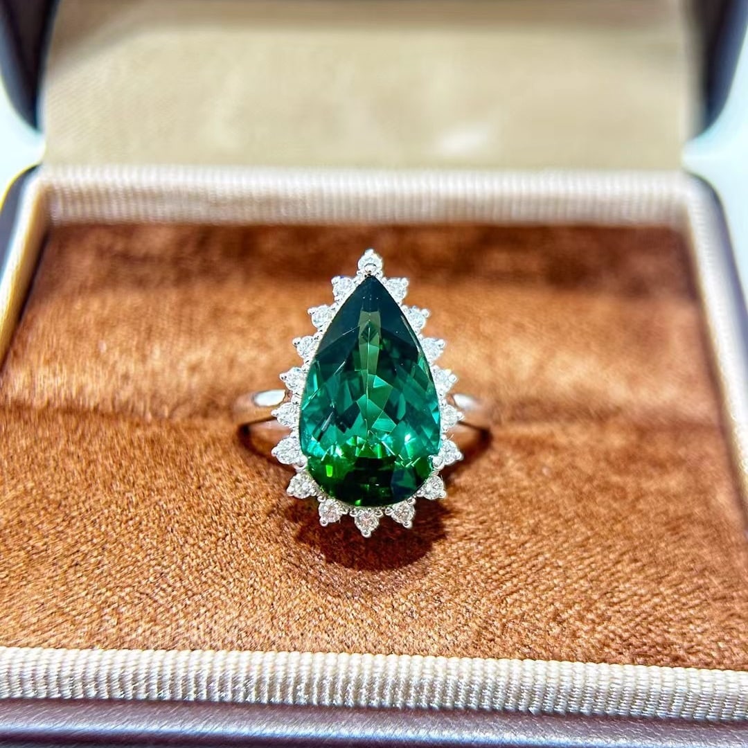 14k Gold 6.30 Ctw Natural Tourmaline & Diamond Ring: Ref:230988031 // gold content:14k gold // ring size:7. 25us // // main gemstone:tourmaline // shape:pear // carat weight:5. 98ct // color:green // treatment:natural // // adjacent gemstone 2 :