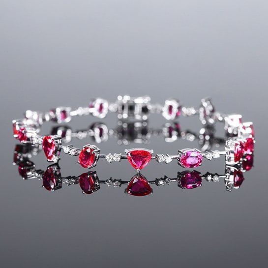 14k Gold 5.18 Ctw Natural Ruby & Diamond Bracelet: Ref:230988049 // gold content:14k gold // main gemstone:ruby // shape:multiply // carat weight:4. 80ct // color:pigeonblood red // treatment:natural // // adjacent gemstone 2 : diamond // number of st
