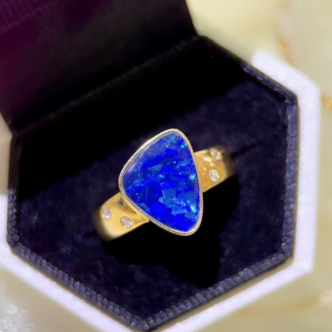 14k Gold 2.34 Ctw Natural Opal & Diamond Ring: Ref:230988089 // gold content:14k gold // ring size:7. 25us // // main gemstone:opal // shape:other // carat weight:2. 28ct // color:blue // treatment:natural // // adjacent gemstone 2 : diamond // sh