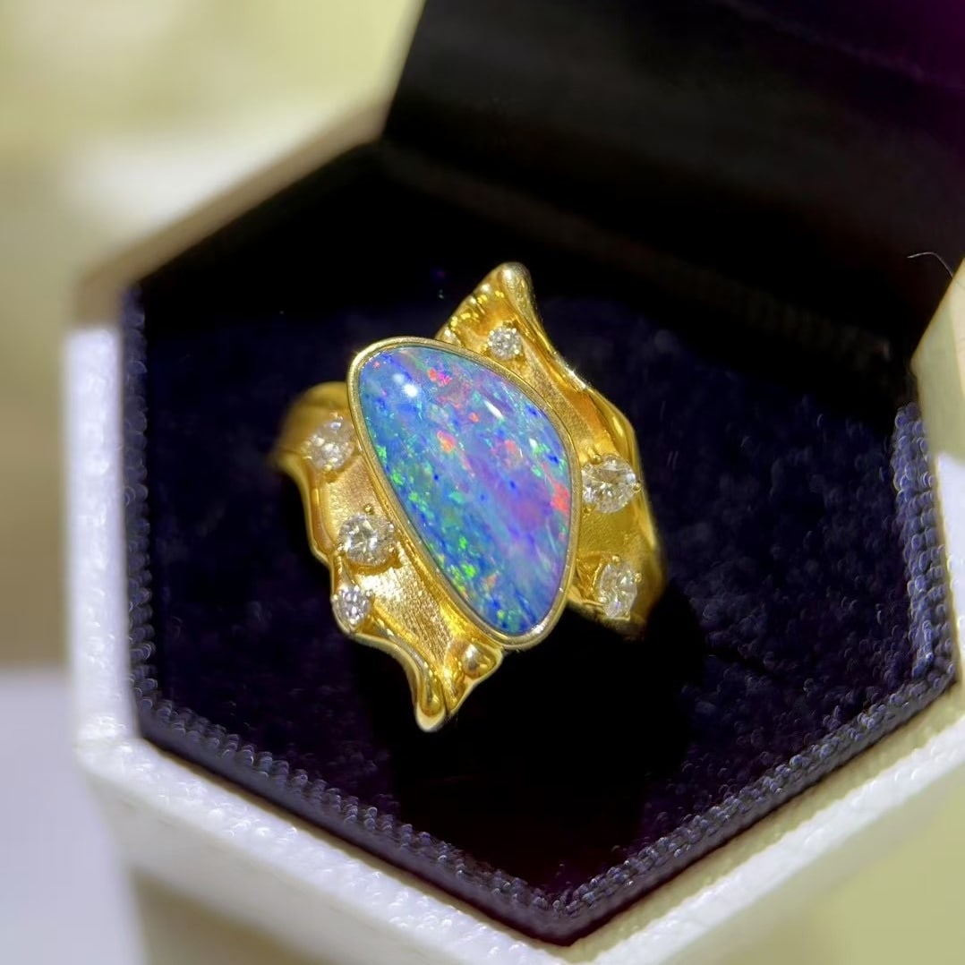 14k Gold 2.31 Ctw Natural Opal & Diamond Ring: Ref:230988090 // gold content:14k gold // ring size:7. 25us // // main gemstone:opal // shape:other // carat weight:2. 03ct // color:color // treatment:natural // // adjacent gemstone 2 : diamond // s