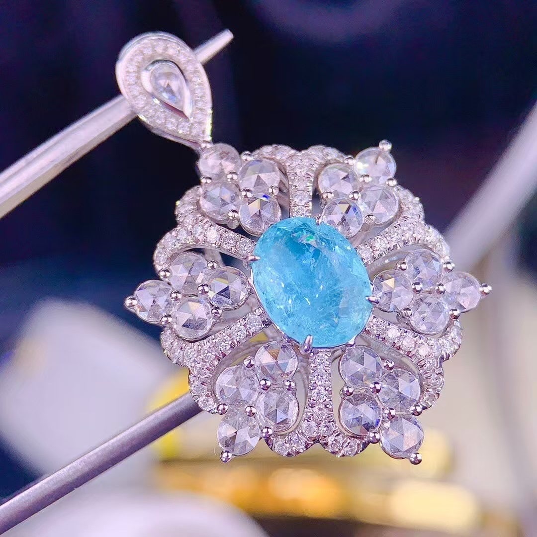 14k Gold 1.55 Ct Natural Paraiba Tourmaline & Diamond Ring/pendant( Without Chain ): Ref:230988104 // gold content:14k gold // ring size:7. 25us // // main gemstone:paraiba tourmaline // shape:oval // carat weight:1. 55ct // color:blue // treatment:natural // // adjacent gemstone 2 : 
