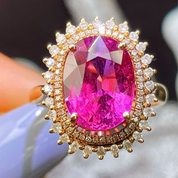 14k Gold 6.3 Ct Natural Tourmaline & Diamond Ring: Ref:230988113 // gold content:14k gold // ring size:7. 25us // // main gemstone:tourmaline // shape:oval // carat weight:6. 3ct // color:red // treatment:natural // // adjacent gemstone 2 : diamond //