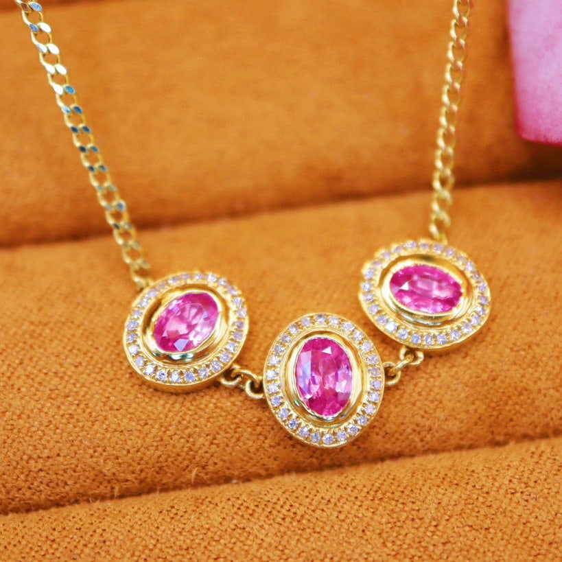 14k Gold 1.69 Ctw Natural Padparadscha Sapphire & Diamond Necklace: Ref:230988118 // gold content:14k gold // main gemstone:padparadscha sapphire // shape:oval // carat weight:1. 46ct // color:orangish pink // treatment:natural // // adjacent gemstone 2 : diamond //