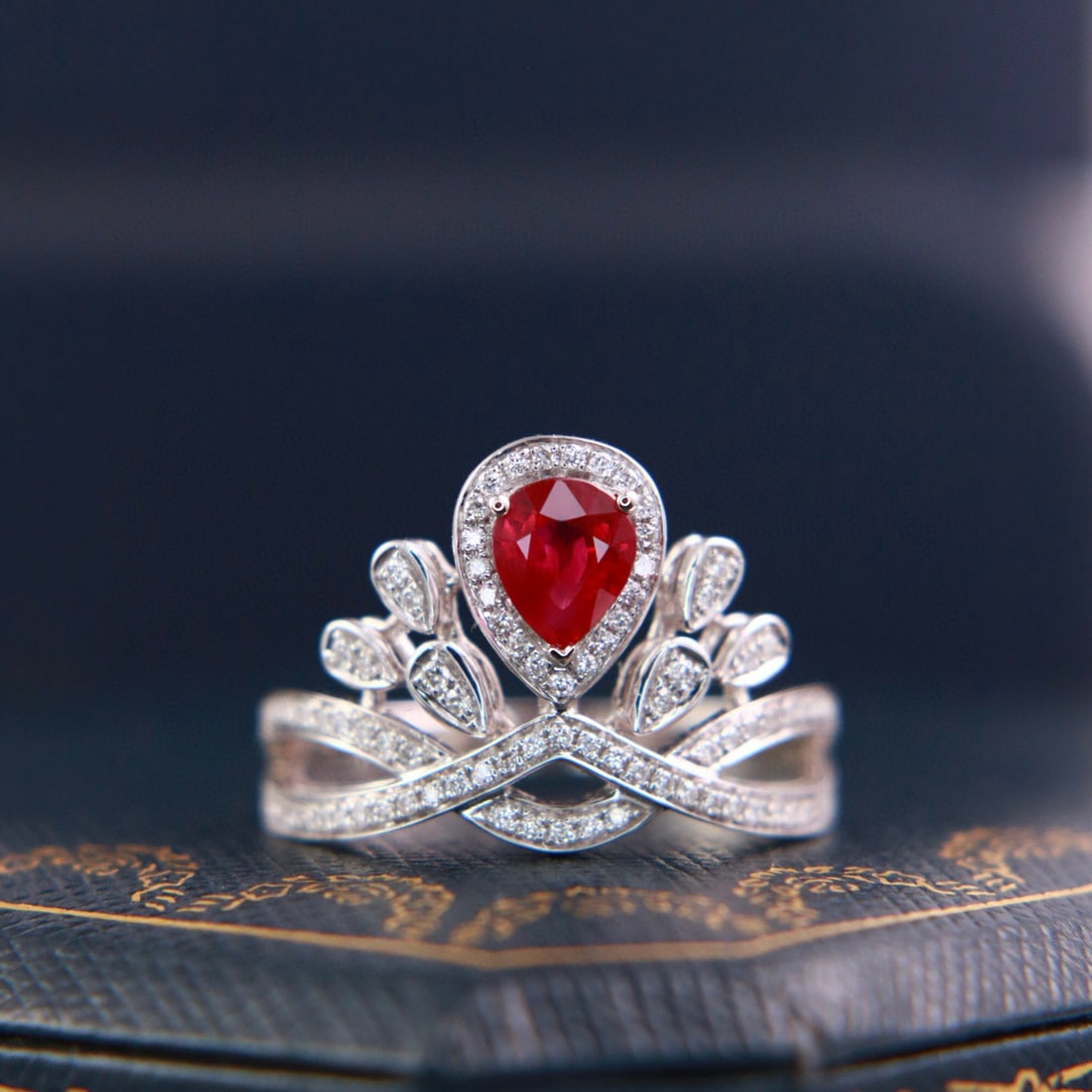 14k Gold 0.88 Ctw Natural Ruby & Diamond Ring: Ref:230988123 // gold content:14k gold // ring size:7. 25us // // main gemstone:ruby // shape:pear // carat weight:0. 62ct // color:pigeonblood red // treatment:natural // // adjacent gemstone 2 :