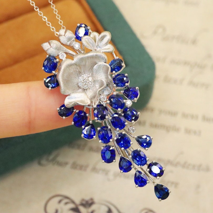 14k Gold 7.39 Ctw Natural Sapphire & Diamond Brooch/pendant( Without Chain ): Ref:230988130 // gold content:14k gold // main gemstone:sapphire // shape:multiply // carat weight:7. 27ct // color:royal blue // treatment:natural // // adjacent gemstone 2 : diamond // number of