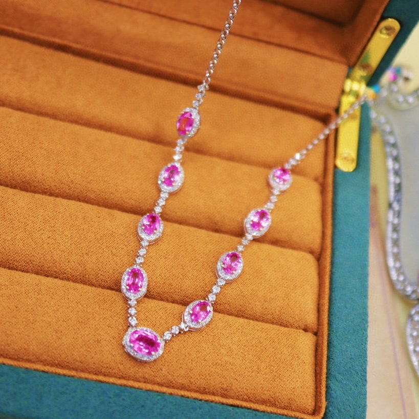 14k Gold 6.23 Ctw Natural Padparadscha Sapphire & Diamond Necklace: Ref:230988132 // gold content:14k gold // main gemstone:padparadscha sapphire // shape:oval // carat weight:5. 35ct // color:orangish pink // treatment:natural // // adjacent gemstone 2 : diamond //