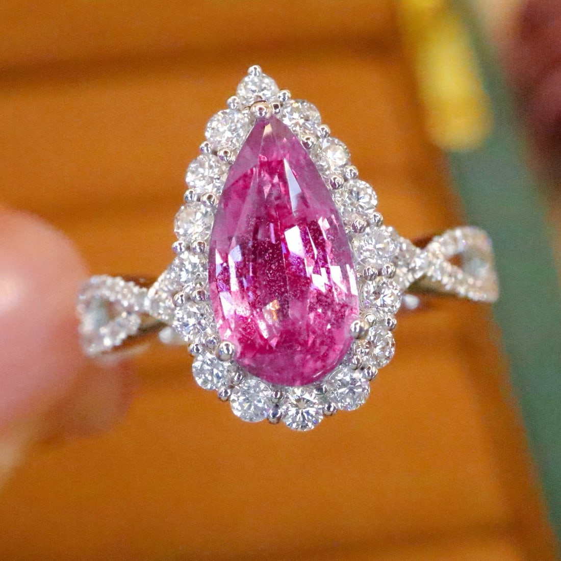 14k Gold 1.98 Ctw Natural Padparadscha Sapphire & Diamond Ring: Ref:230988133 // gold content:14k gold // ring size:7. 25us // // main gemstone:padparadscha sapphire // shape:pear // carat weight:1. 55ct // color:orangish pink // treatment:natural // // adjacent