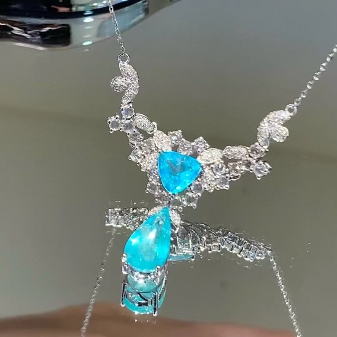 14k Gold 2.6 Ct Natural Paraiba Tourmaline & Diamond & Sapphire Necklace: Ref:230988160 // gold content:14k gold // main gemstone:paraiba tourmaline // shape:multiply // carat weight:2. 6ct // color:blue // treatment:natural // // adjacent gemstone 2 : diamond //