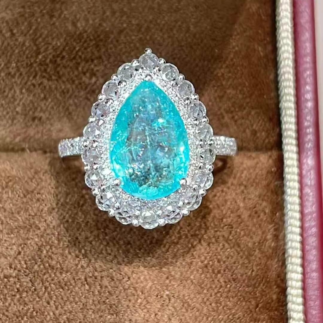14k Gold 3.1 Ct Natural Paraiba Tourmaline & Diamond & Sapphire Ring: Ref:230988161 // gold content:14k gold // ring size:7. 25us // // main gemstone:paraiba tourmaline // shape:pear // carat weight:3. 1ct // color:blue // treatment:natural // // adjacent gemstone 2 :