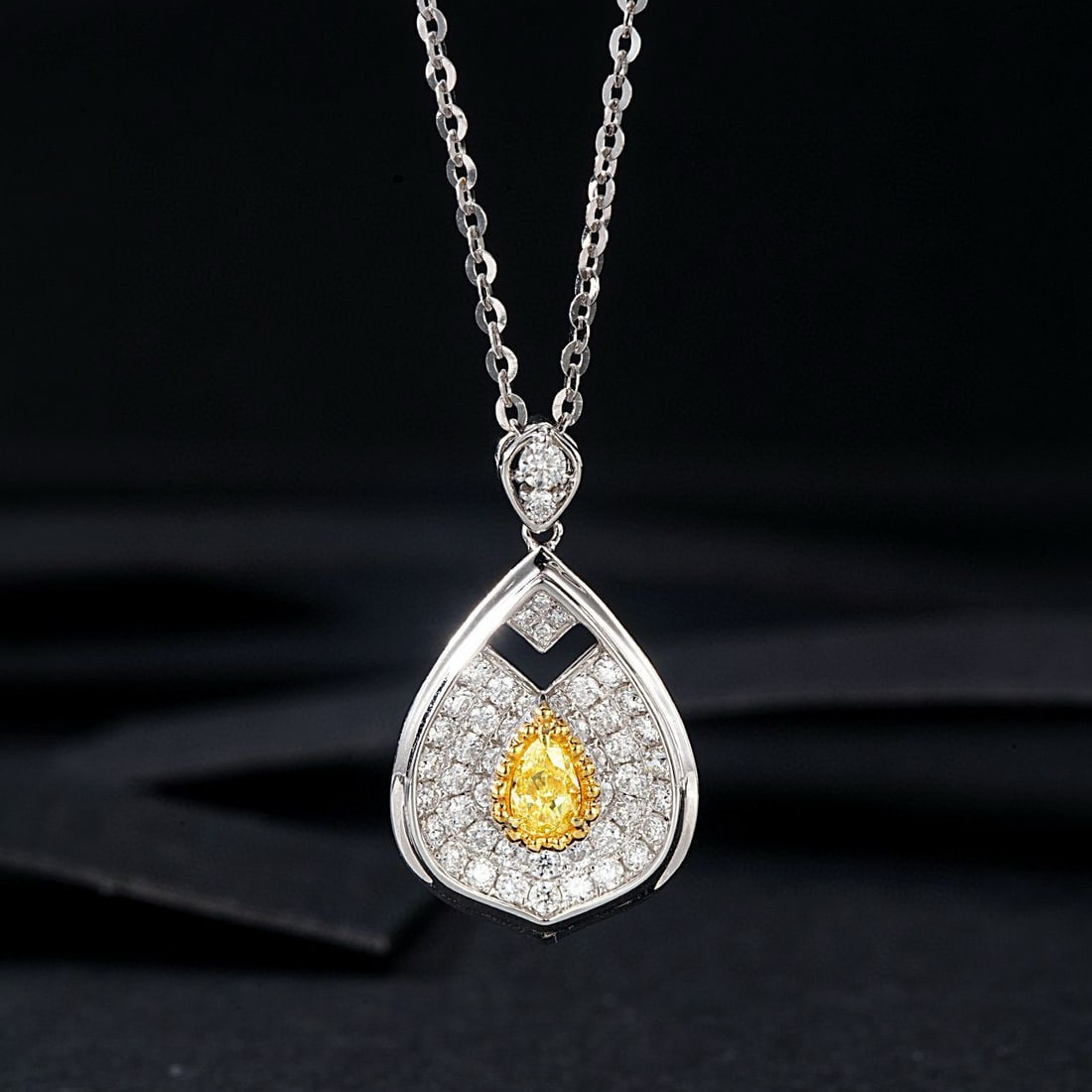 14k Gold 0.74 Ctw Natural Yellow Diamond & Diamond Pendant( Without Chain ): Ref:230988179 // gold content:14k gold // main gemstone:yellow diamond // shape:pear // carat weight:0. 22ct // color:yellow // treatment:natural // // adjacent gemstone 2 : diamond // shape:round //