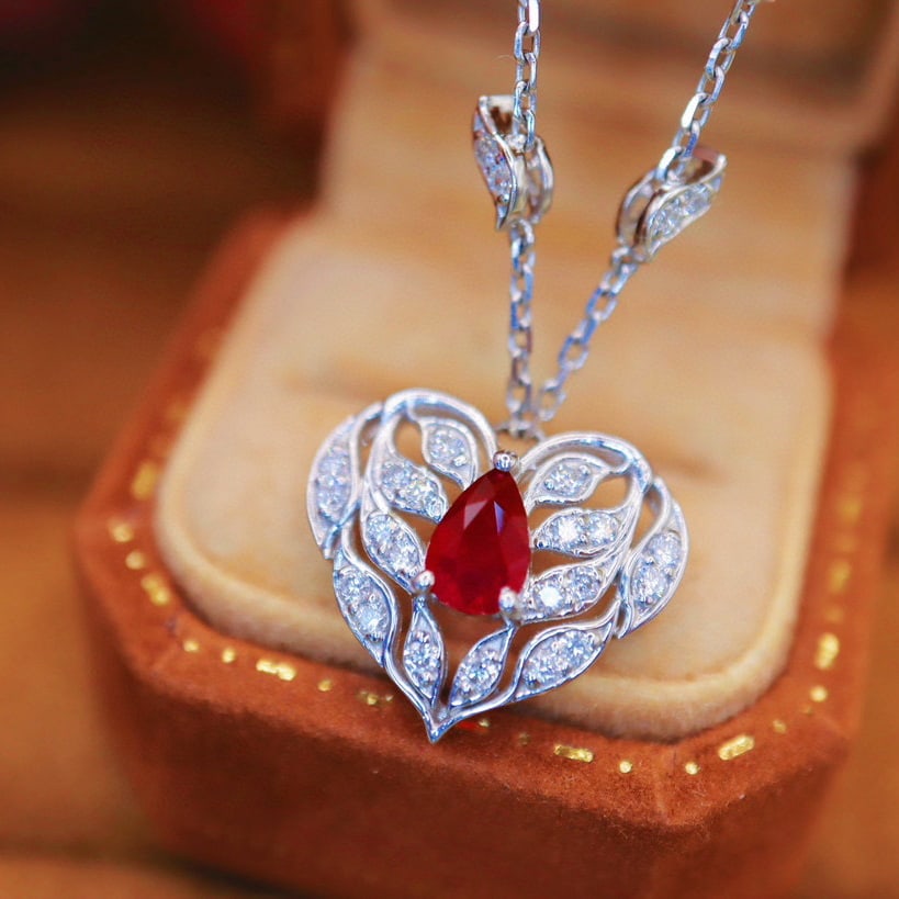 14k Gold 0.94 Ctw Natural Ruby & Diamond Necklace: Ref:230988207 // gold content:14k gold // main gemstone:ruby // shape:pear // carat weight:0. 50ct // color:red // treatment:natural // // adjacent gemstone 2 : diamond // number of stones:44 // shape
