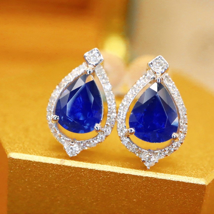 14k Gold 1.43 Ctw Natural Sapphire & Diamond Earrings: Ref:230988212 // gold content:14k gold // main gemstone:sapphire // shape:pear // carat weight:1. 26ct // color:royal blue // treatment:natural // // adjacent gemstone 2 : diamond // number of
