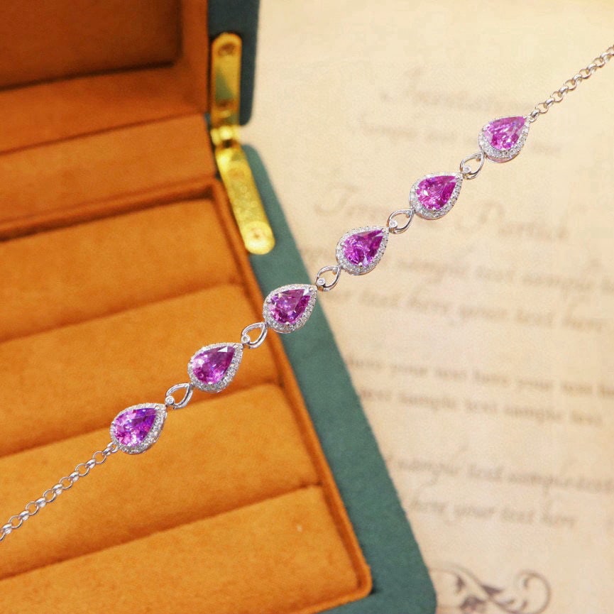 14k Gold 4.47 Ctw Natural Sapphire & Diamond Bracelet: Ref:230988218 // gold content:14k gold // main gemstone:sapphire // shape:pear // carat weight:4. 08ct // color:purple // treatment:natural // // adjacent gemstone 2 : diamond // number of stones:131 