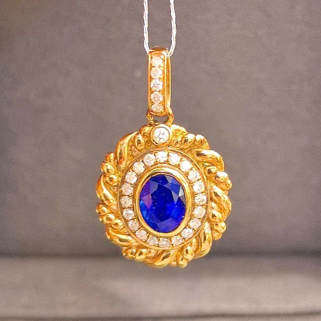 14k Gold 0.94 Ctw Natural Sapphire & Diamond Pendant( Without Chain ): Ref:230988235 // gold content:14k gold // main gemstone:sapphire // shape:oval // carat weight:0. 80ct // color:royal blue // treatment:natural // // adjacent gemstone 2 : diamond // shape:round //