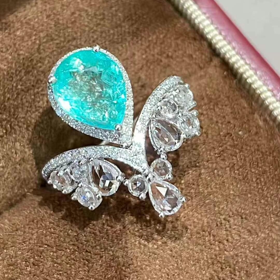 14k Gold 2.1 Ct Natural Paraiba Tourmaline & Diamond & Sapphire Ring: Ref:230988236 // gold content:14k gold // ring size:7. 25us // // main gemstone:paraiba tourmaline // shape:pear // carat weight:2. 1ct // color:blue // treatment:natural // // adjacent gemstone 2 :