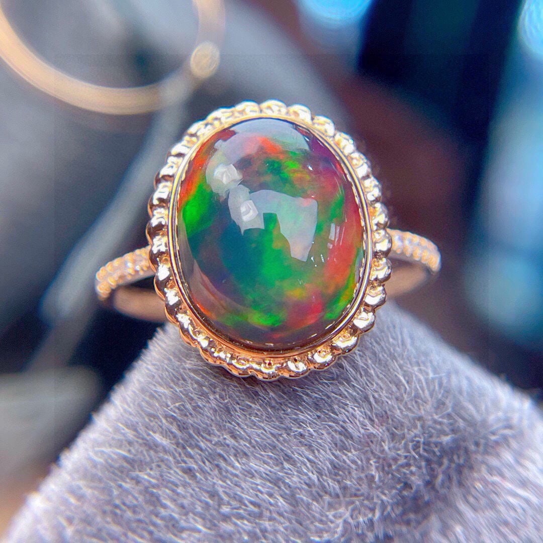 14k Gold 4.2 Ct Natural Opal & Diamond Ring: Ref:230988256 // gold content:14k gold // ring size:7. 25us // // main gemstone:opal // shape:oval // carat weight:4. 2ct // color:color // treatment:natural // // adjacent gemstone 2 : diamond //