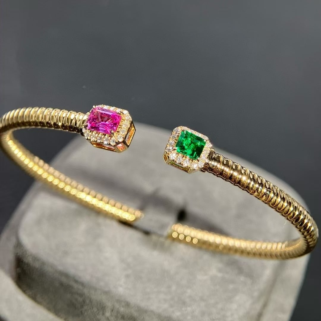 14k Gold 0.93 Ctw Natural Sapphire & Emerald & Diamond Bangle: Ref:230988273 // gold content:14k gold // main gemstone:sapphire & emerald // shape:octagonal // carat weight:0. 77ct // color:pink & green // treatment:natural // // adjacent gemstone 2 : diamond //