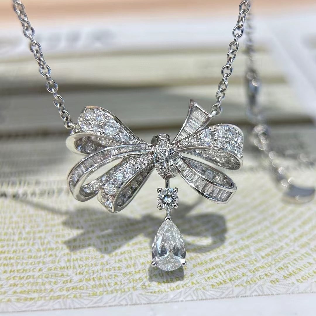 Gia Certified 14k Gold 1.63 Ctw Natural G Si2 Pear Diamond Necklace: Ref:230988278 // gold content:14k gold // main gemstone:diamond // certified:gia // shape:pear // carat weight:0. 5ct // clarity grade:si2 // color:g // treatment:natural // // adjacent gemstone 2 :