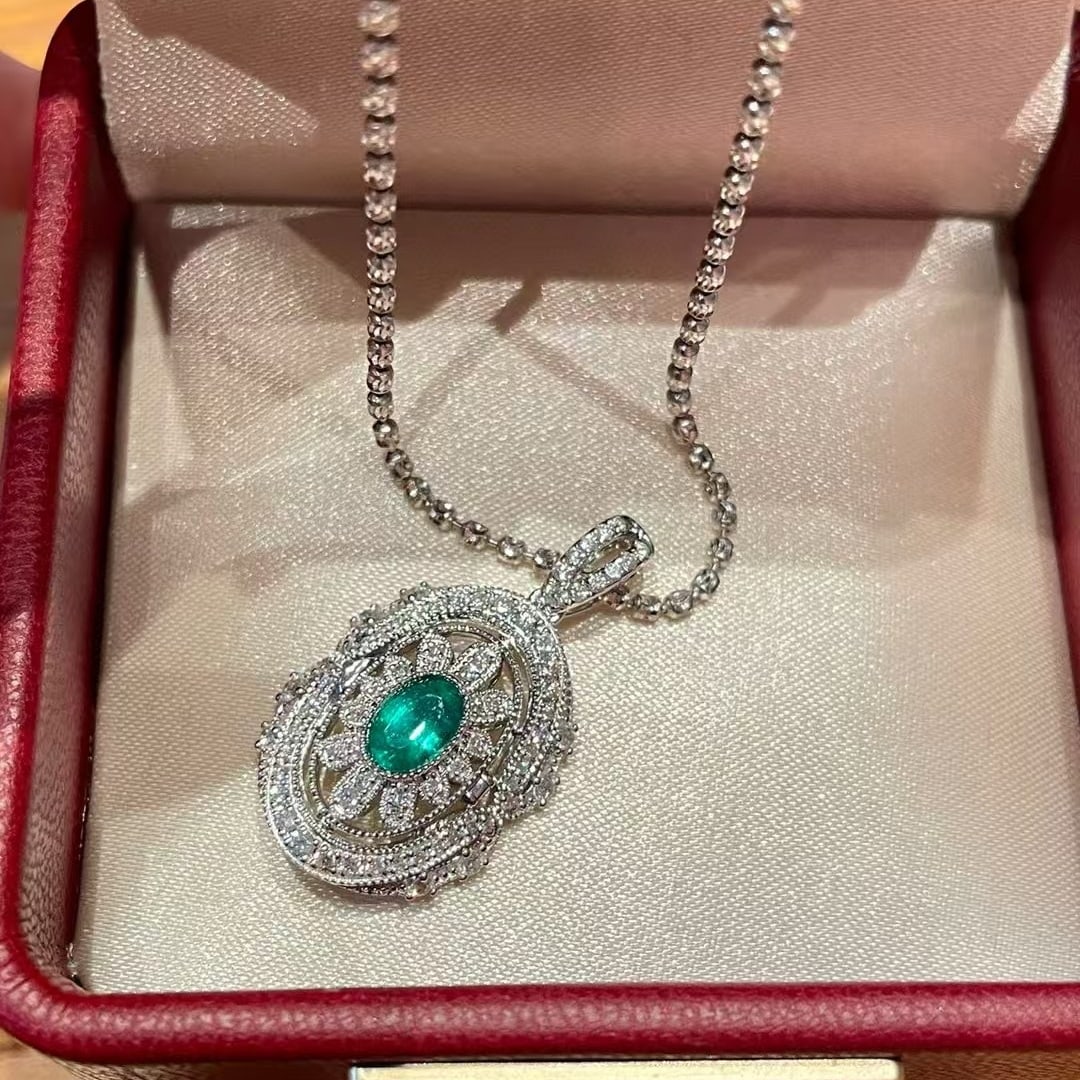 14k Gold 0.5 Ct Vivid Green Natural Emerald & Diamond Pendant( Without Chain ): Ref:230988289 // gold content:14k gold // main gemstone:emerald // shape:oval // carat weight:0. 5ct // color:vivid green // treatment:natural // // adjacent gemstone 2 : diamond // shape:round // cla