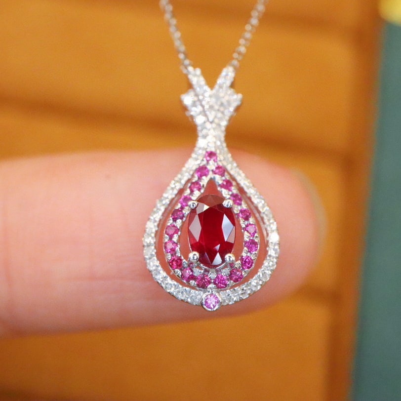 14k Gold 0.52 Ctw Natural Ruby & Ruby Necklace: Ref:230988294 // gold content:14k gold // main gemstone:ruby // shape:oval // carat weight:0. 4ct // color:red // treatment:natural // // adjacent gemstone 2 : ruby // shape:round // carat weight:0.