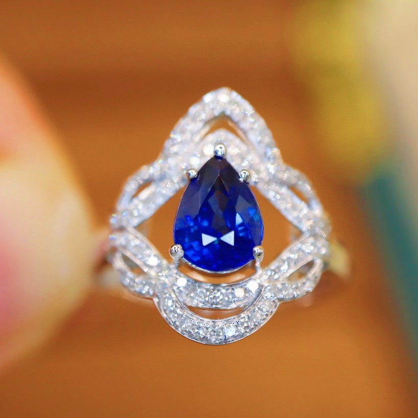 14k Gold 1.56 Ctw Natural Sapphire & Diamond Ring: Ref:230988296 // gold content:14k gold // ring size:7. 25us // // main gemstone:sapphire // shape:pear // carat weight:1. 33ct // color:royal blue // treatment:natural // // adjacent gemstone 2 :