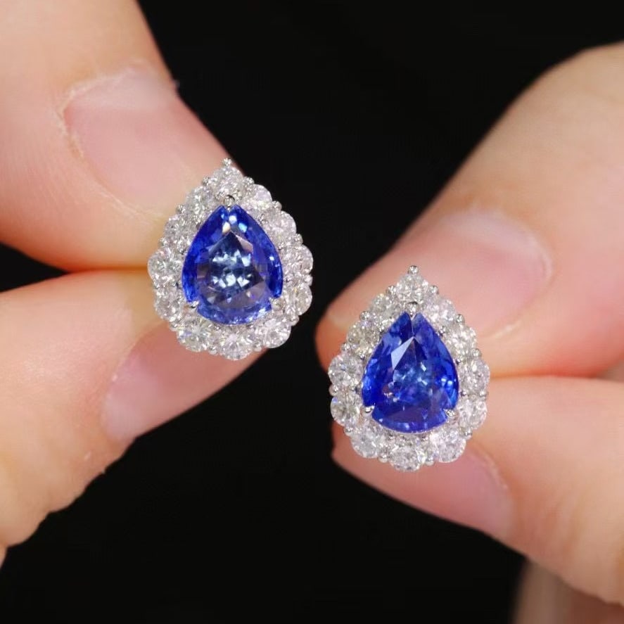 14k Gold 2.98 Ctw Natural Sapphire & Diamond Earrings: Ref:230988320 // gold content:14k gold // main gemstone:sapphire // shape:pear // carat weight:2. 09ct // color:blue // treatment:natural // // adjacent gemstone 2 : diamond // shape:round // carat we