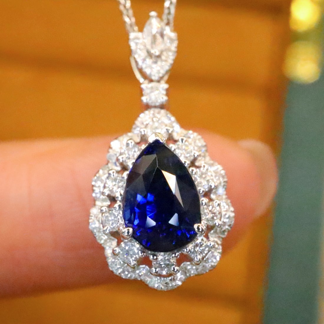 14k Gold 2.42 Ctw Natural Sapphire & Diamond Pendant( Without Chain ): Ref:230988340 // gold content:14k gold // main gemstone:sapphire // shape:pear // carat weight:2. 06ct // color:royal blue // treatment:natural // // adjacent gemstone 2 : diamond // number of stones: