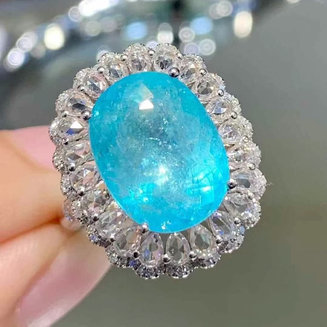 14k Gold 7.56 Ct Natural Paraiba Tourmaline & Sapphire & Diamond Ring: Ref:230988347 // gold content:14k gold // ring size:7. 25us // // main gemstone:paraiba tourmaline // shape:oval // carat weight:7. 56ct // color:blue // treatment:natural // // adjacent gemstone 2 : 